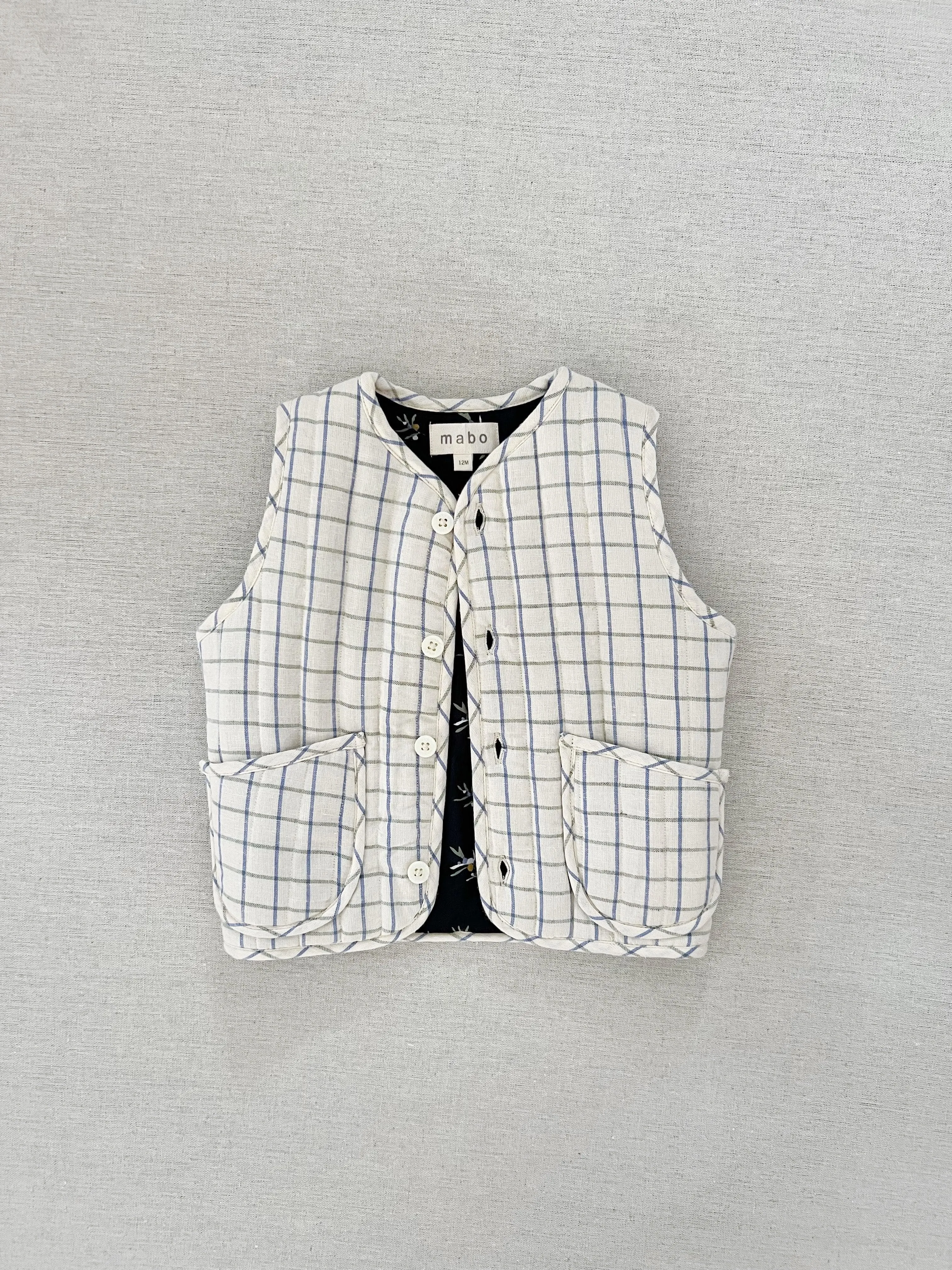 bowen quilted vest in cream windowpane